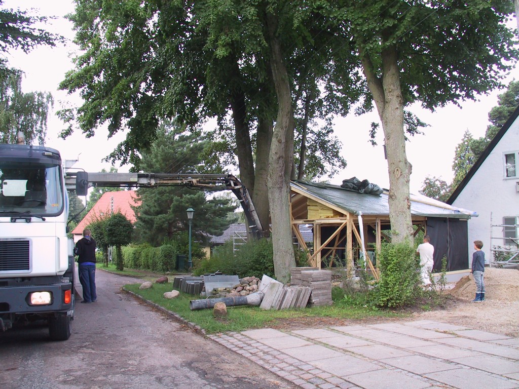 Rejsning af trækonstruktion med betonpumpe